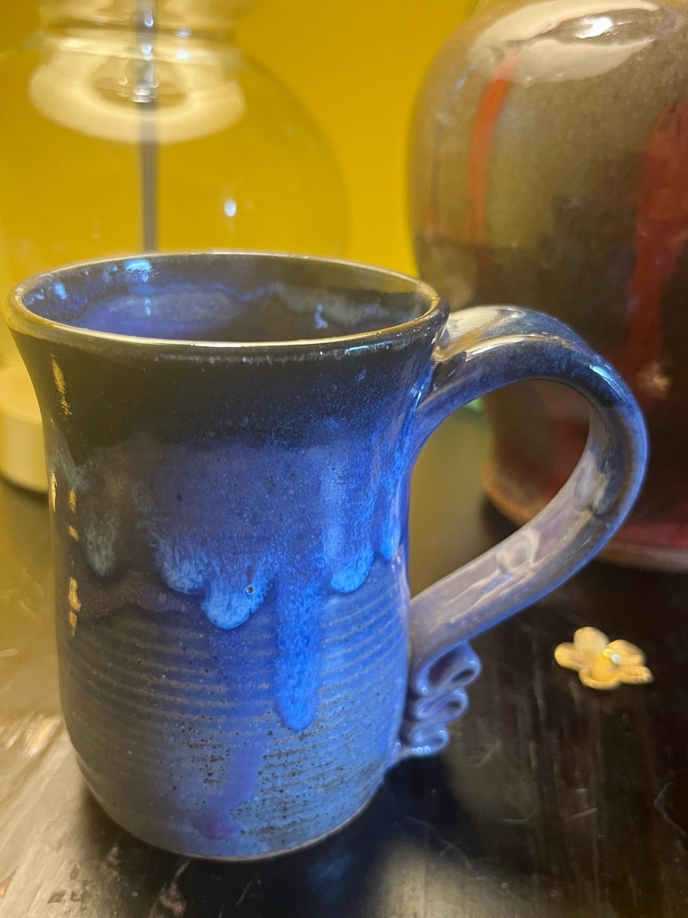 Hand thrown studio pottery mug with layered drip glaze cobalt blue